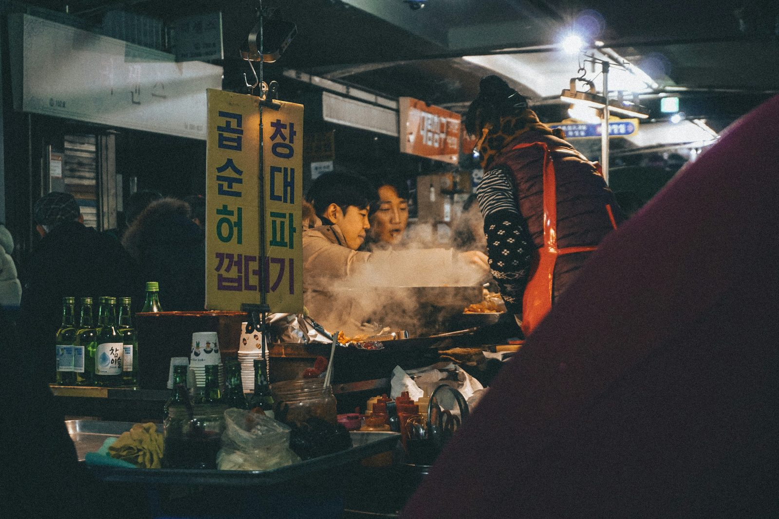 Group of diners sharing food and laughing